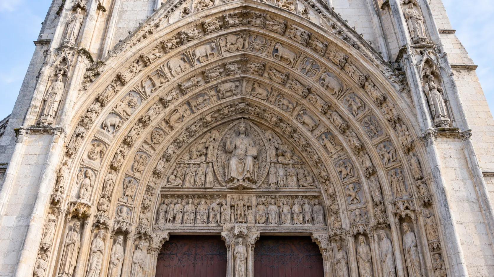 chartres royal portal with zodiac signs and monthly labors