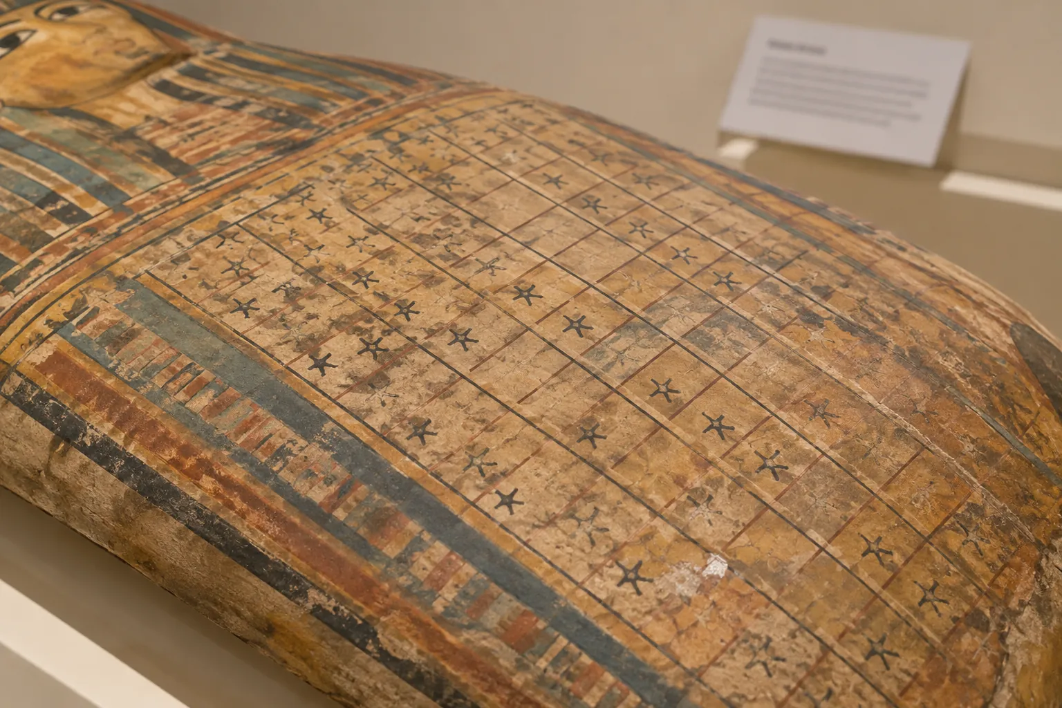 Egyptian coffin-lid replica with a decanal star table in a museum